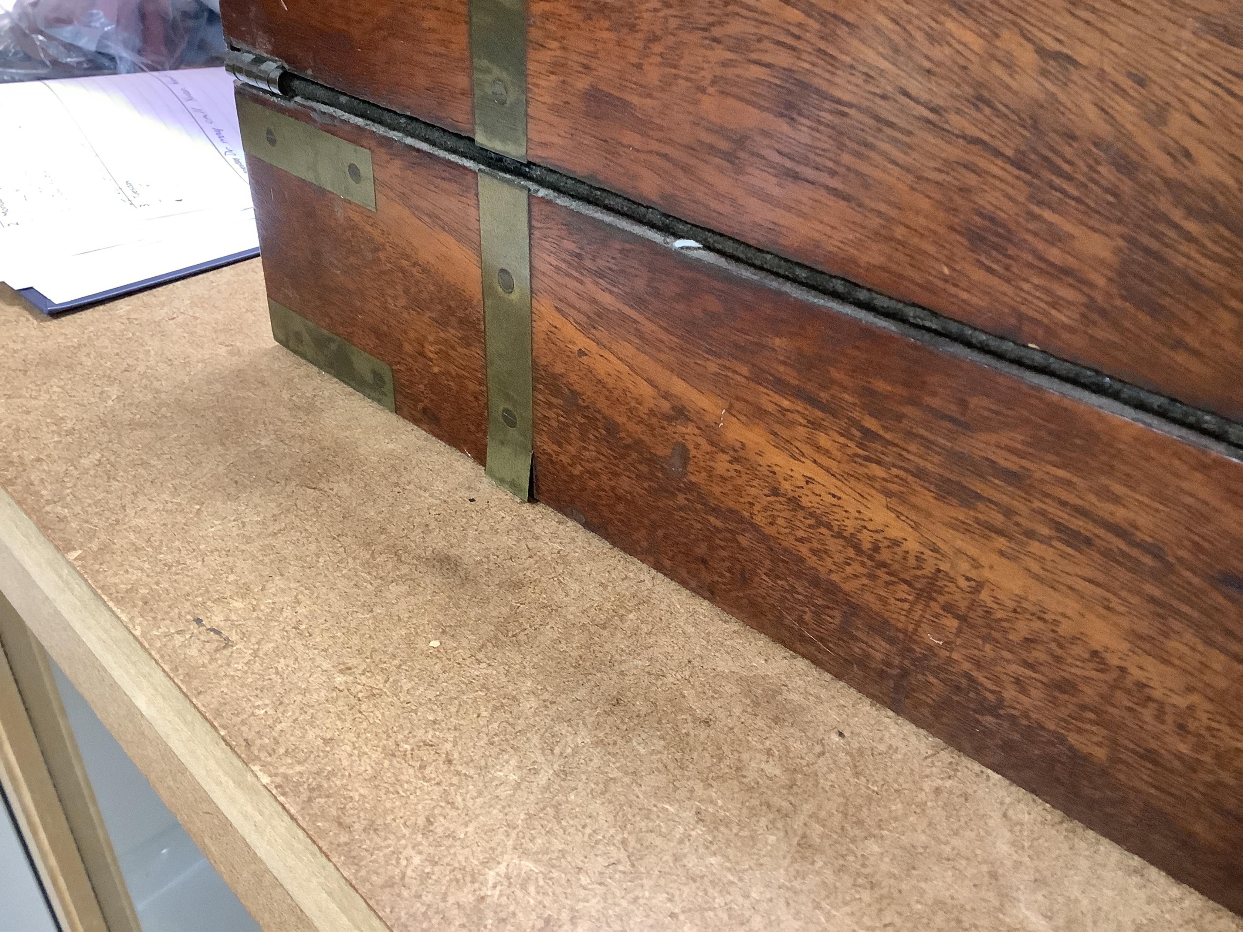 An early 19th century brass bound mahogany writing slope with maker's label for J. Allen, 45cm wide